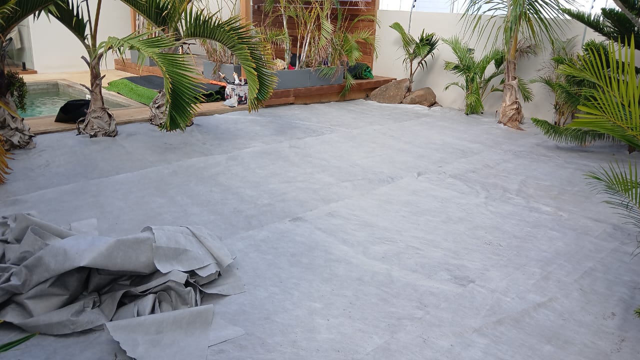 Layering of weed barrier